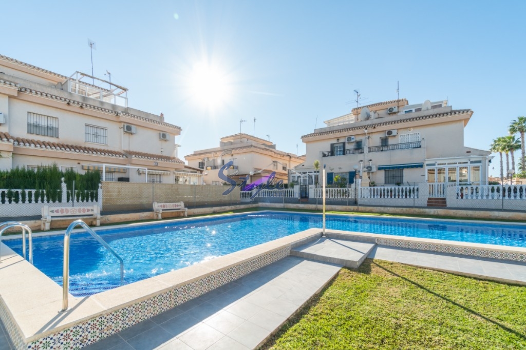 Buy townhouse with garage and pool close to the sea in Playa Flamenca, Orihuela Costa. ID: 4277