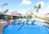 Buy townhouse with pool in Riomar V, close to the sea in Mil Plameras, Orihuela Costa. ID: 4288