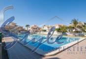 Comprar dúplex adosado con piscina, muy cerca del mar y ambas playas en Playa Flamenca, Orihuela Costa. ID: 4790