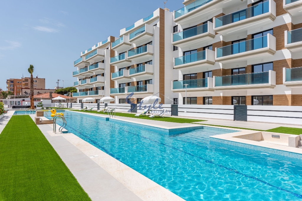 for sale beach side new  apartments with 3 bedrooms in Costa Blanca. ID.ON773