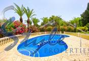 For sale an exclusive luxury villa with a large plot in Villamartin, Costa Blanca, Spain. ID3484