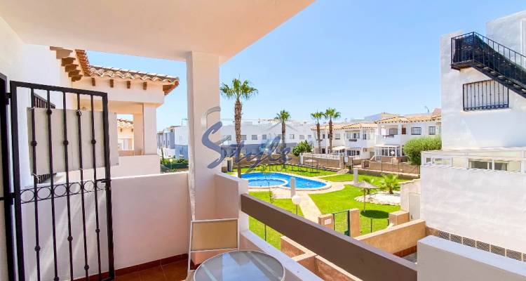 for sale top floor south facing apartment with solarium in Ciñuelica R14, Punta Prima, Costa Blanca, Spain.ID2700