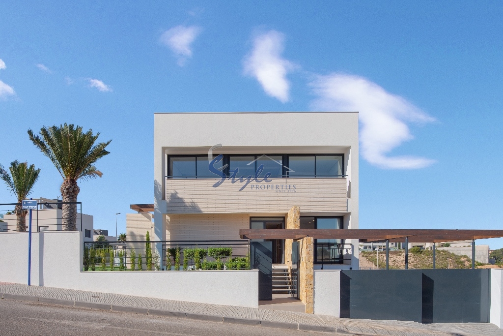 For sale beach side new villa en Dehesa de Campoamor, Costa Blanca, Spain.ON1370