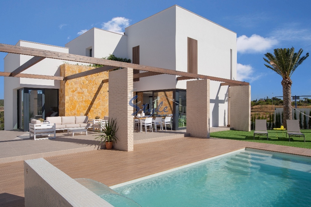 For sale beach side new villa en Dehesa de Campoamor, Costa Blanca, Spain.ON1370