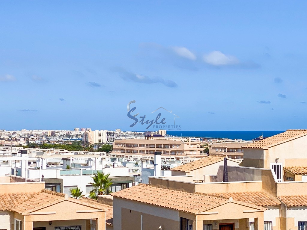 En venta adosado con vistas al mar en Ciñuelica, Punta Prima, Costa Blanca, España. ID1199