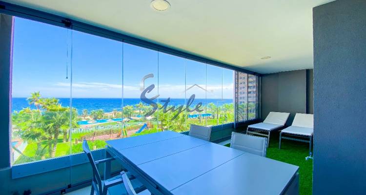 First line to the sea apartment with Tourist License for sale in ¨Panorama Mar¨ Punta Prima, Costa Blanca, Spain. ID.3677