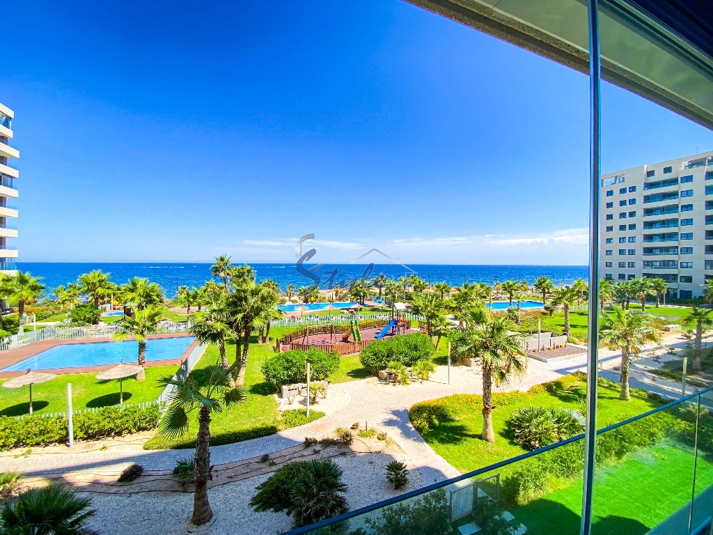 First line to the sea apartment with Tourist License for sale in ¨Panorama Mar¨ Punta Prima, Costa Blanca, Spain. ID.36