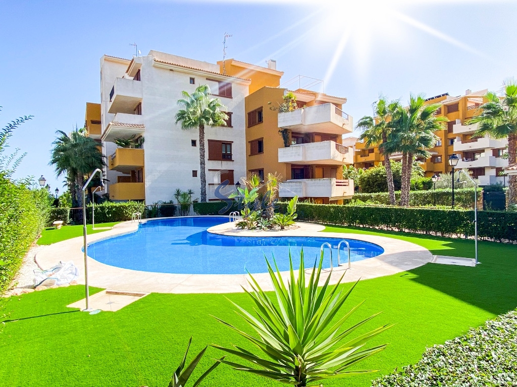 For sale beach side  south facing apartment in Parque Recoleta, Punta Prima, Torrevieja, Costa Blanca,Spain. ID1424