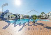 To buy a sunny ground floor apartment in Punta Prima, Costa Blanca, Spain. ID3431