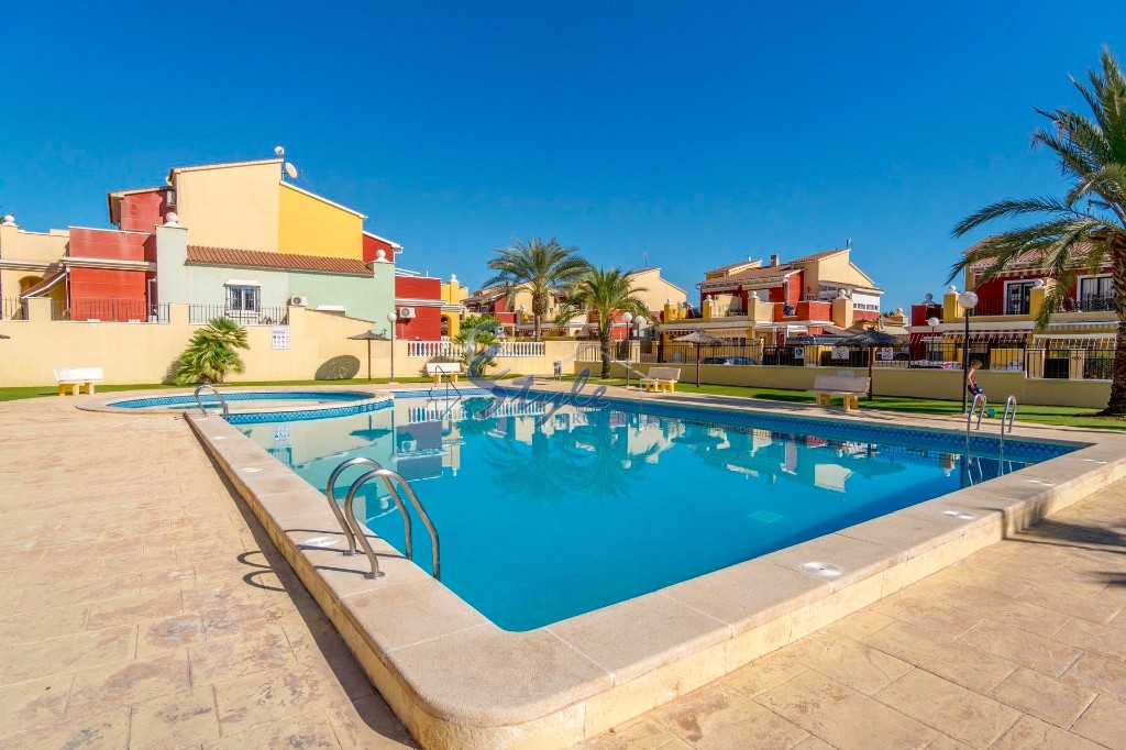 Buy quad townhouse with garden and pool in Torrevieja. ID 4938