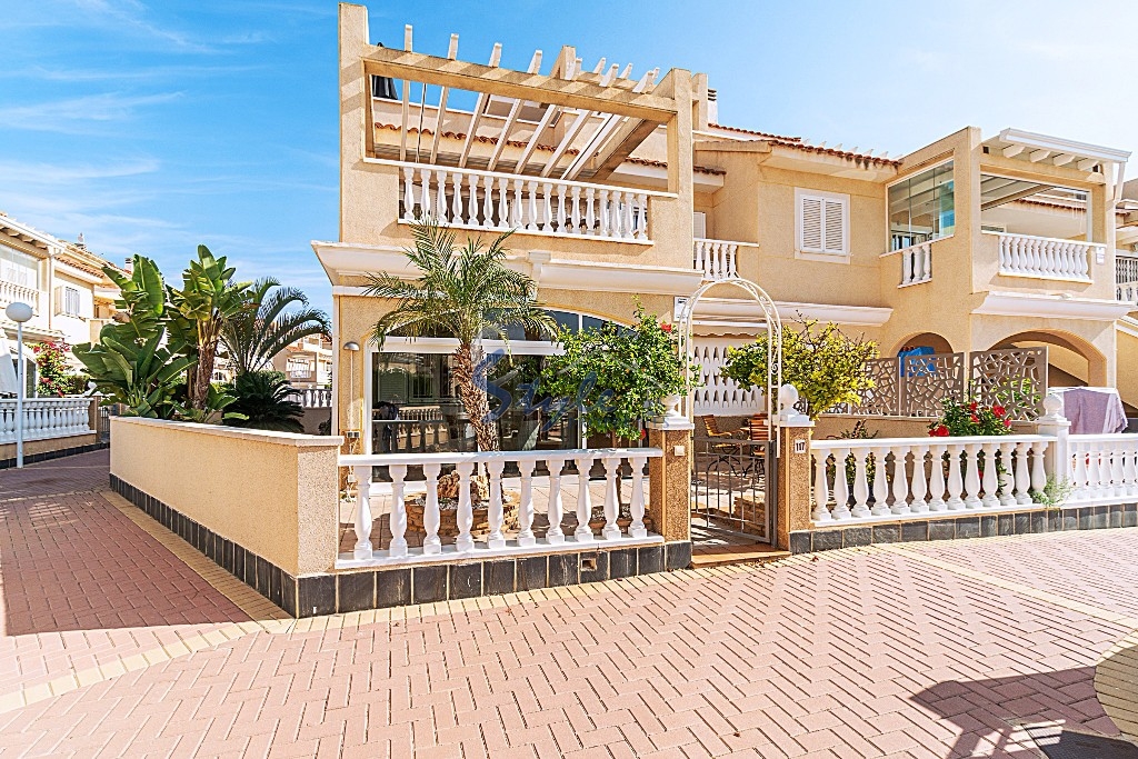 Buy quad townhouse with garden and pool in Playa Flamenca, Orihuela Costa. ID 4939