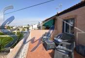 Buy townhouse with garden and porch in Torrevieja. ID 4960