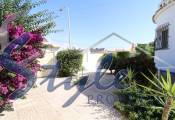 Buy independent villa with lovely garden areas and pool El Chaparral, Torrevieja, Costa Blanca. ID: 6016