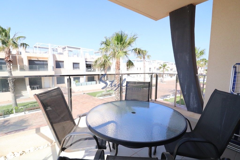 For sale top floor apartment with tourist license close to the beach in Mil Palmeras, Costa Blanca, Spain. ID1513