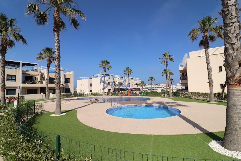 For sale top floor apartment with tourist license close to the beach in Mil Palmeras, Costa Blanca, Spain. ID1513