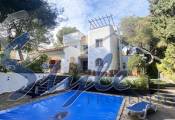 For sale luxury beach side villa with 5 bedrooms in Campoamor, Orihuela Costa, Costa Blanca, Spain. ID1556