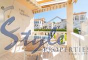 Se vende amplia casa adosada con jardín en Playa Flamenca, Orihuela Costa, España. ID1382