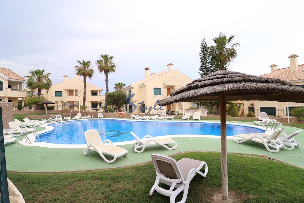 Купить семейный таунхауз с видом на море недалеко от пляжа в Campoamor Golf. ID 6046