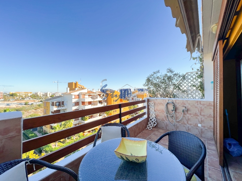 for sale beachside apartment with sea views in La Recoleta, Punta Prima, Costa Blanca. ID2710