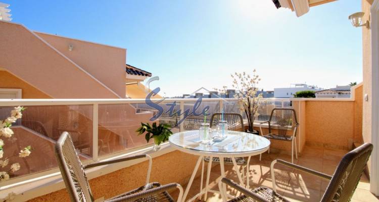 For sale top floor apartment with solarium and patio in Vista Azul XXVII in Punta Prima, Costa Blanca, Spain. ID1452