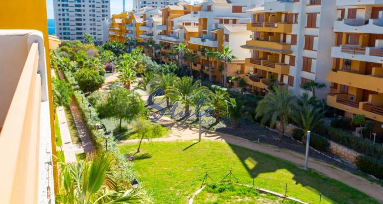 Seaside apartments for short-term rent in gated community ¨Parque Recoleta¨ in Punta Prima, Orihuela Costa, Costa Blanca, Spain. ID103