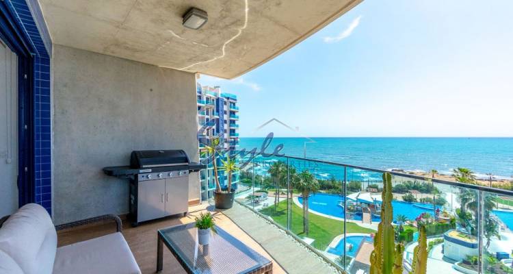 For sale frontline apartment in SeaSenses, Punta Prima, Costa Blanca, Spain.ID1394