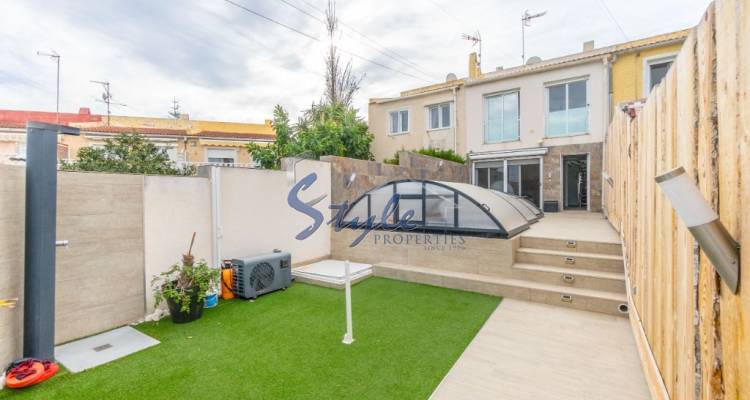 Buy townhouse with garden and pool in Torrevieja. ID 6250